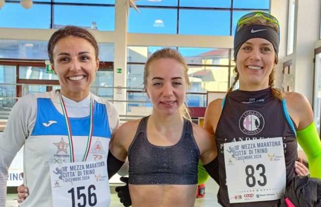 trino mezza maratona podio